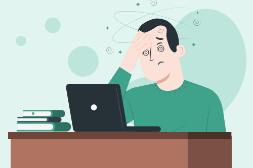 A confused employer shakes his head while looking at a bad CV on his computer.