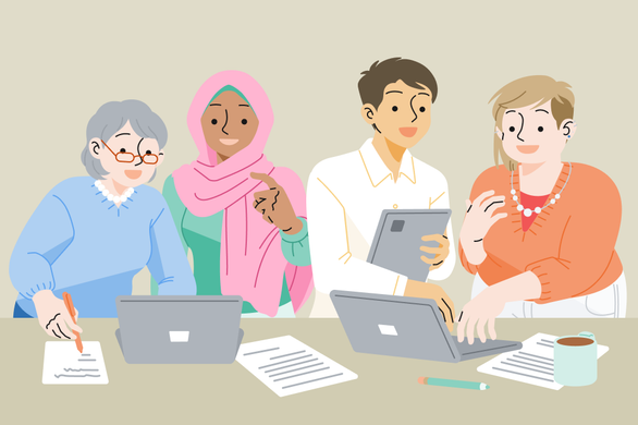 A diverse group of colleagues collaborating at a desk: an elderly white woman, a Muslim woman wearing a hijab, an Indian man, and a plus-sized white woman.